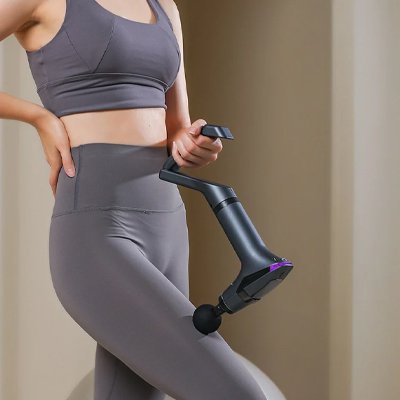 pistolet-de-massage-jambe-femme-therapie